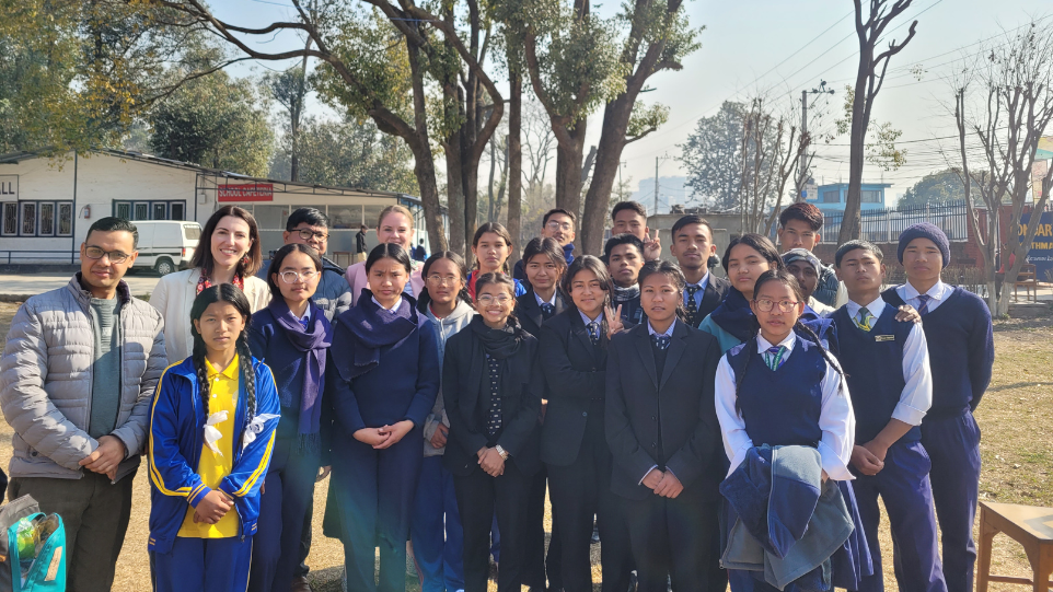 Group photo with former Hamro Ghar students now enrolled in the Laboratory Secondary School in Kathmandu, Nepal. Photo credit: GoodWeave International