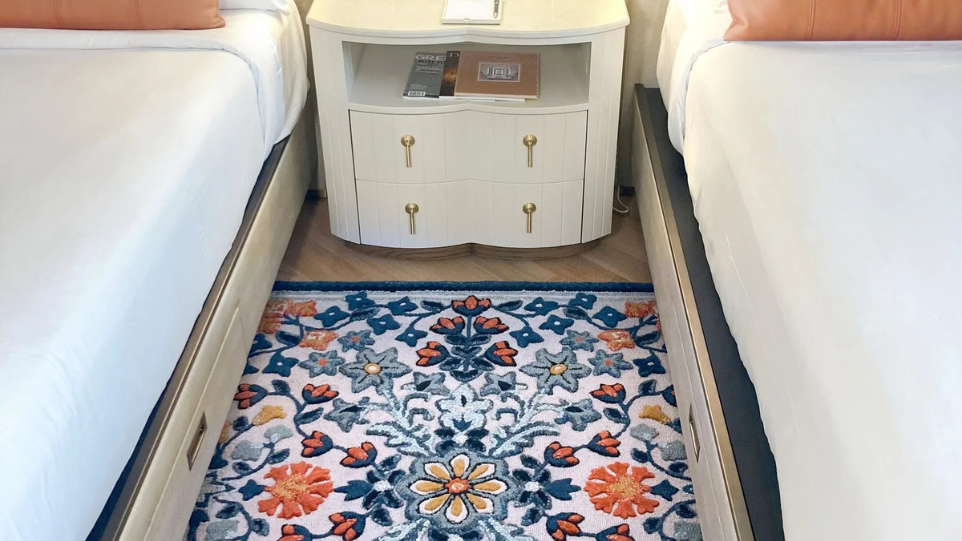 Eye Heart Hand’s custom ‘Florette’ rug in a guest room at the Delamar Greenwich Harbor hotel. Photo credit: Eye Heart Hand